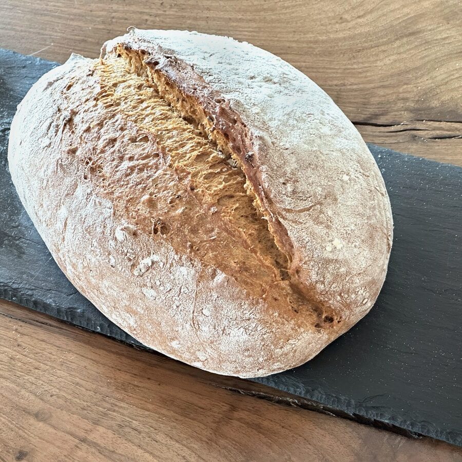 A Dark Crunch loaf with a well-opened ear